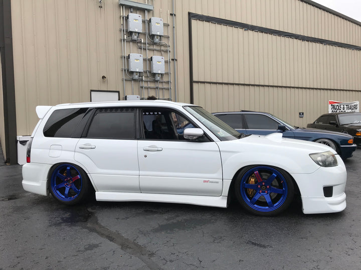 03-08 Forester window vents SG
